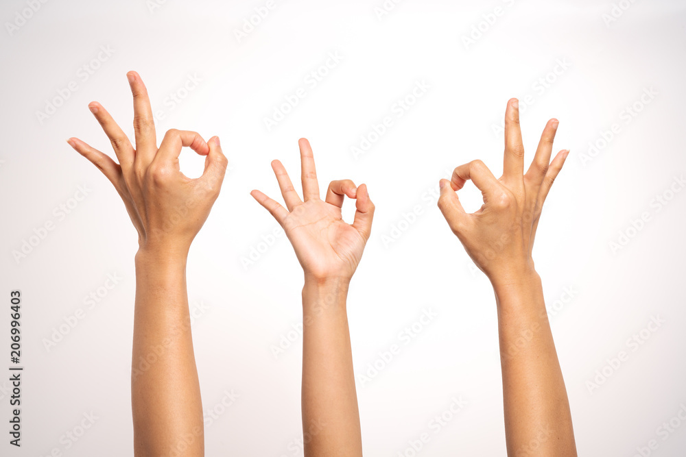 women hand OK sign gesturing on white background in three action women hand OK sign gesturing on white background in three action