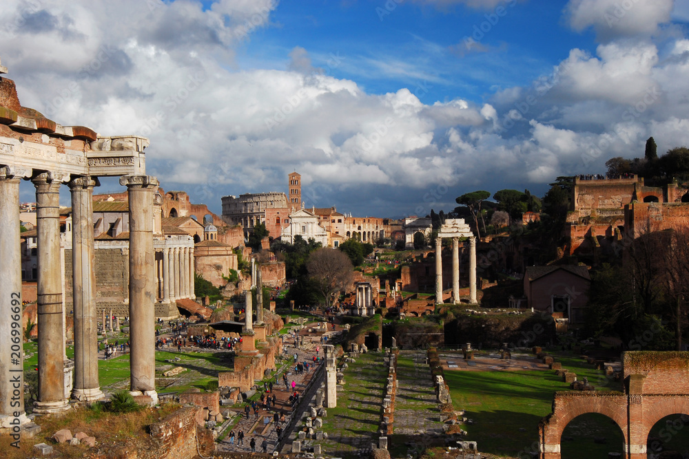 View of the Roman Forum ancient monuments with beautiful clouds from Capitoline Hill in Rome