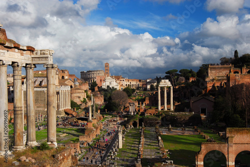 View of the Roman Forum ancient monuments with beautiful clouds from Capitoline Hill in Rome