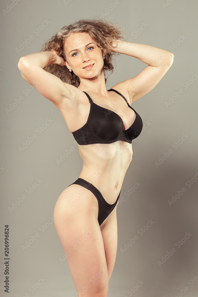 Young woman with beautiful slim perfect body in bikini Young woman with beautiful slim perfect body in bikini