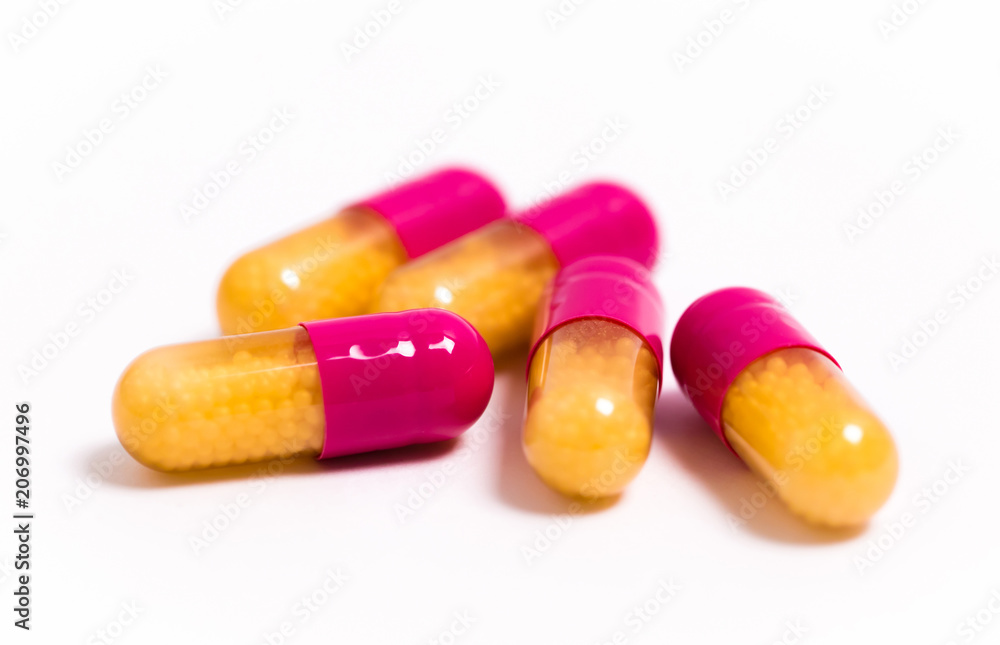 Tablets and capsules isolated on a white background a variety of medicinal medications for female and male health, biodegradable supplements and vitamins for heart health and contraceptives Tablets and capsules isolated on a white background a variety of medicinal medications for female and male health, biodegradable supplements and vitamins for heart health and contraceptives