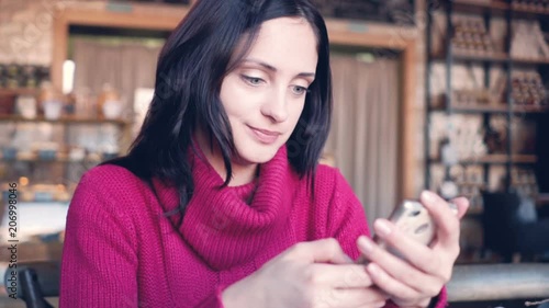 Wallpaper Mural Beautiful young woman type message on mobile phone Slow mo footage Torontodigital.ca