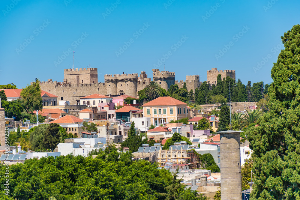 View of rooftops and Grand master palace in background from city walls (Rhodes, Greece)