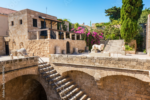 Staircase of medieval house with statues in old town in City of Rhodes (Rhodes, Greece) photo