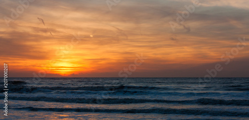 Sundown over the sea in the Netherlands