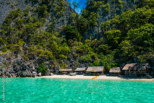 Little houses on a beach in the Philippines © Grietje