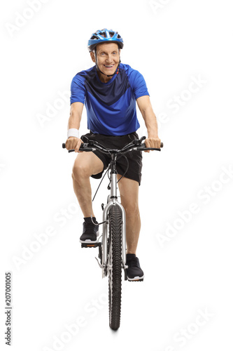 Mature man riding a bicycle
