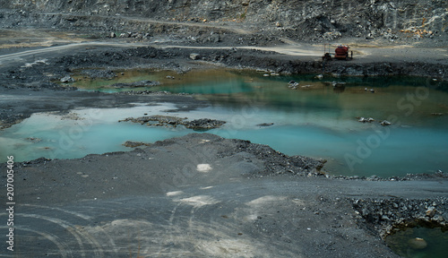 Copper or other rock mining area with ponds in Asia photo