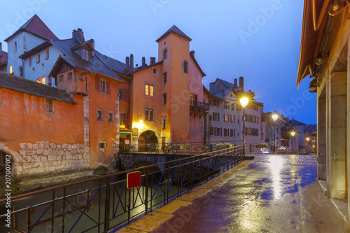 Famous colorful houses and Thiou river during morning blue hour in old city of Annecy, Venice of the Alps, France