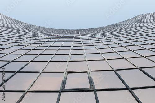 Glass surface of skyscrapers view in district of business centers with reflection on it  black and white