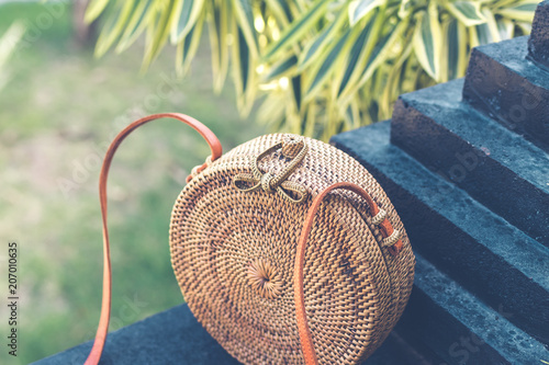 Natural organic handmade rattan handbag closeup. Nude. photo