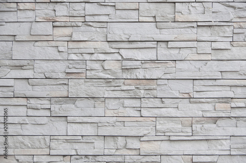 Modern brick wall, slab stone pattern as background. 