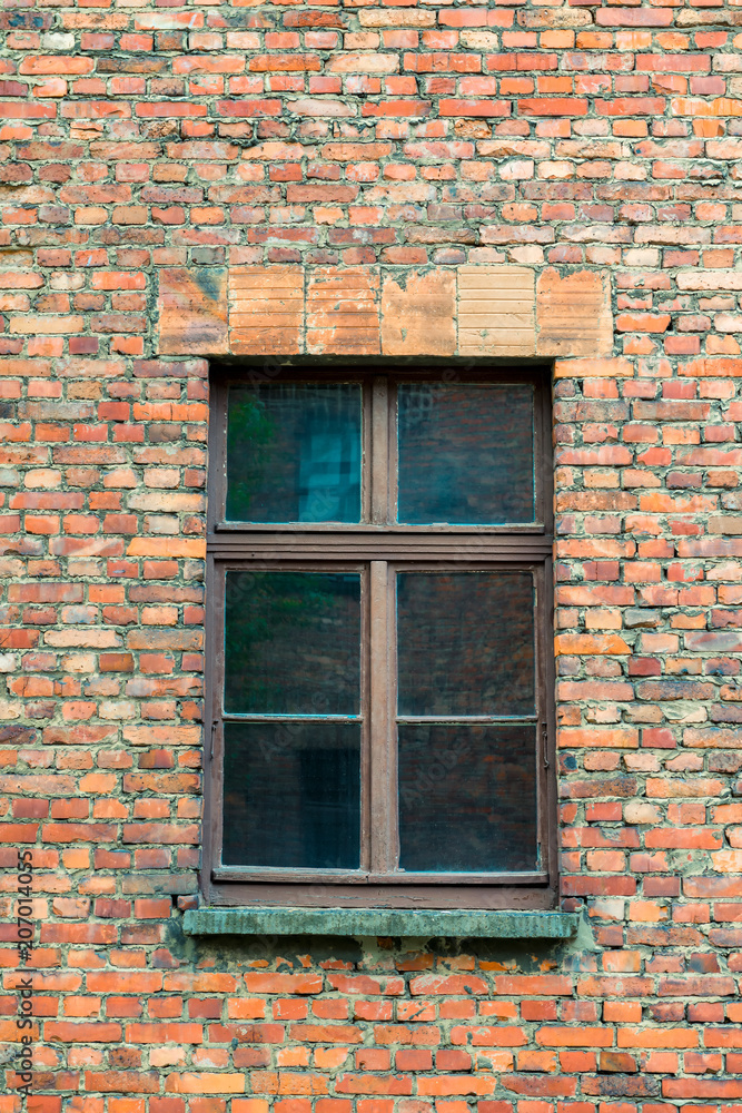 a window in a brick old house close up