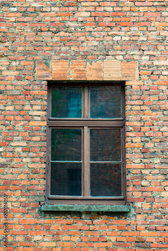 a window in a brick old house close up