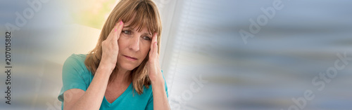 Mature woman having a headache