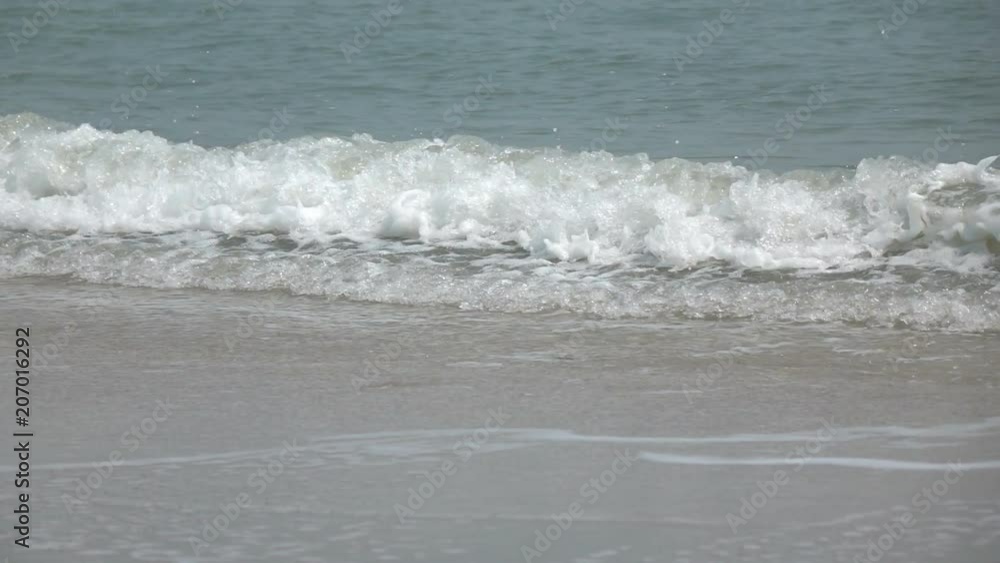 Sea waves on the tropical beach slow motion Sea waves on the tropical beach slow motion