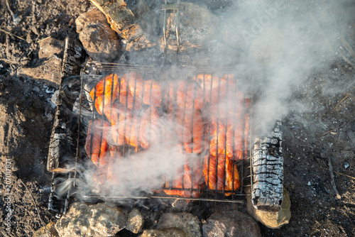 meat on fire camp. hiking concept. cooking on wild nature.