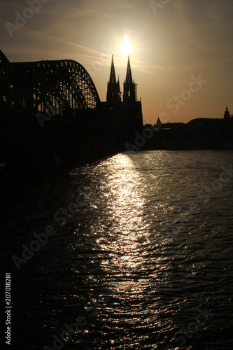 Cologne Koln Germany during sunset, Cologne bridge with cathedral photo