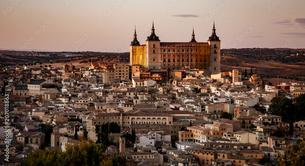 Alcazar towers over the city of Toledo, Spain