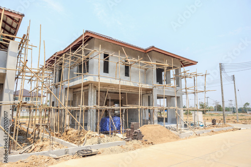 house under construction with autoclaved aerated concrete block structure at building site © Kwangmoozaa