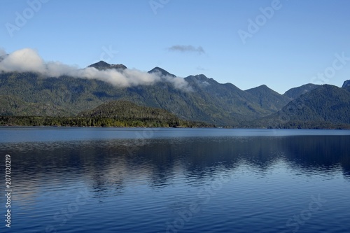 view across the Kennedy Lake, towards the mountains of the Clayoquot Plateau on Vancouver Island, British Columbia Canada © skyf