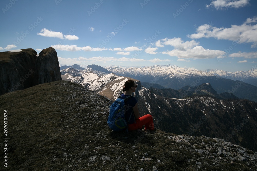 Fototapeta premium Tourist admires the mountains in Adygea