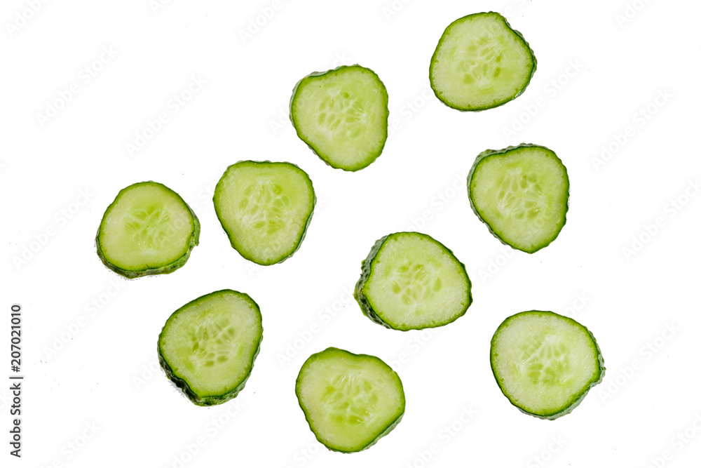 Cucumber, whole and sliced, isolated on white background Cucumber, whole and sliced, isolated on white background