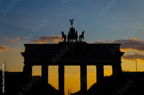 Silhouette of the Brandenburg gate (Brandenburger Tor) with sunset sky background