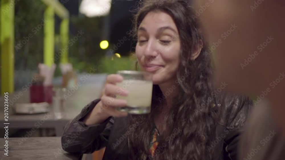 Cute Couple Flirt And Enjoy Drinks At An Outdoor Restaurant, Slow Motion Closeup Cute Couple Flirt And Enjoy Drinks At An Outdoor Restaurant, Slow Motion Closeup