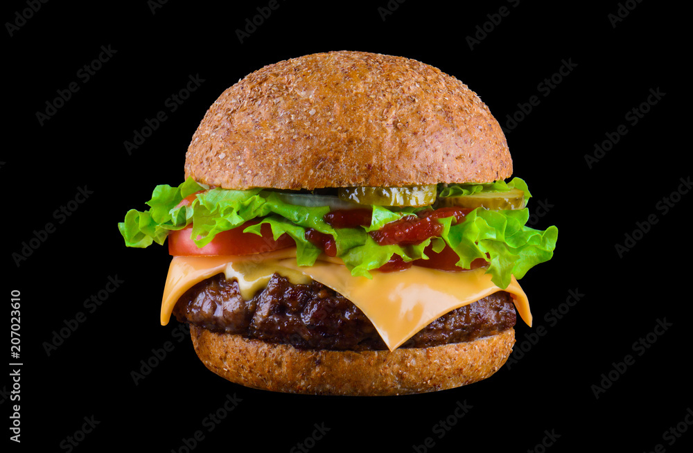Big tasty hamburger or cheeseburger isolated on black background with grilled meat, cheese, tomato, bacon, onion. Burger closeup Big tasty hamburger or cheeseburger isolated on black background with grilled meat, cheese, tomato, bacon, onion. Burger closeup