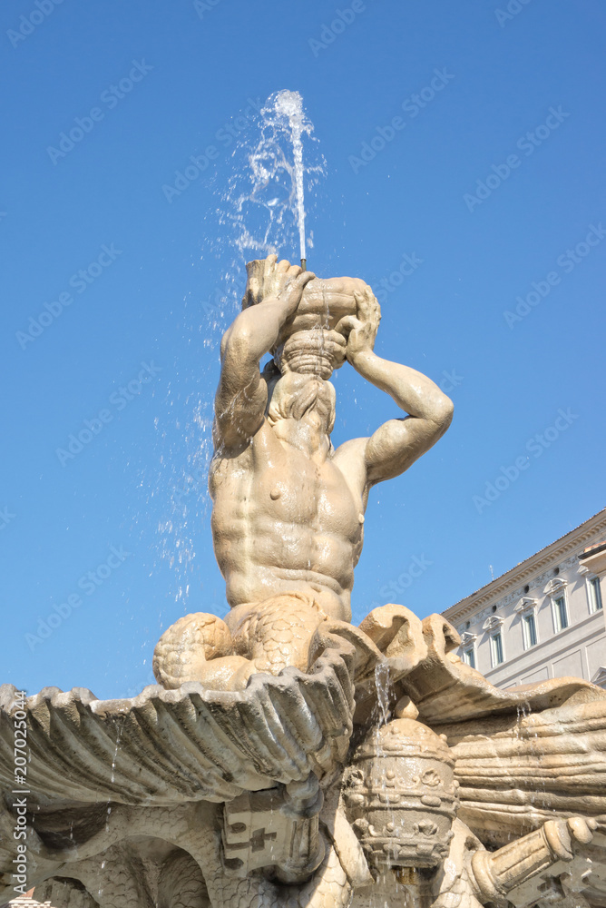Triton Fountain in Barberini square in Rome, Italy