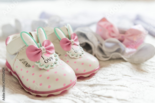 Little shoes with love writting and hearth - close up