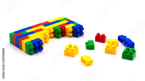 Plastic building blocks isolated on white background