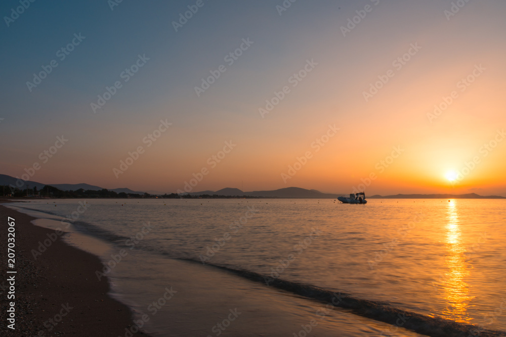 Sunrise reflection; Marathonas beach, Athens area, Greece