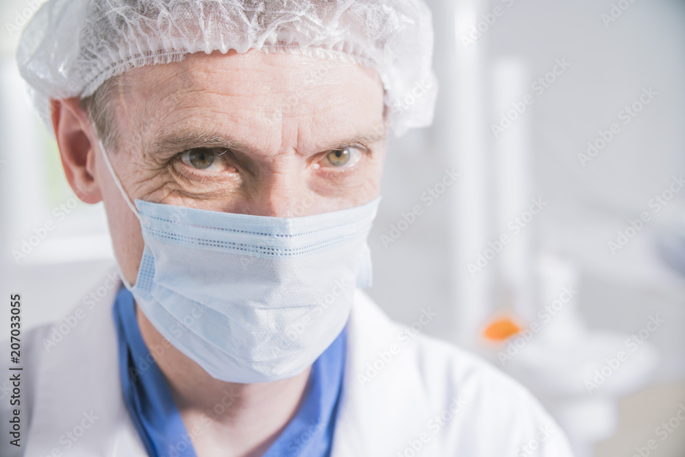 doctor in medical mask close-up, male