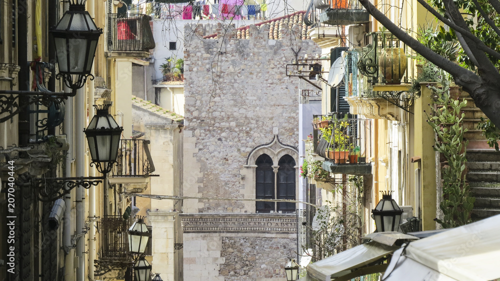 typical view in the main street of Taormina, Sicily, Italy