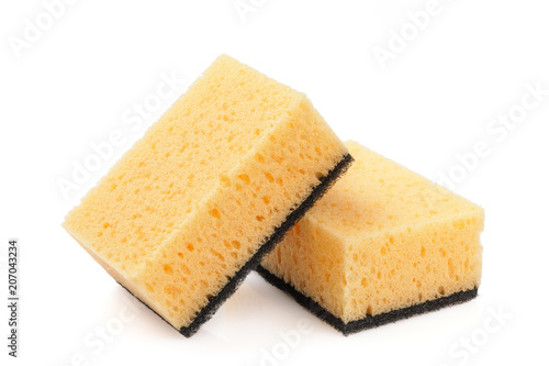 Two yellow sponge for kitchen isolated on white background.