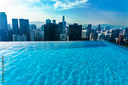 Luxury Swimming pool on rooftop with cityscape