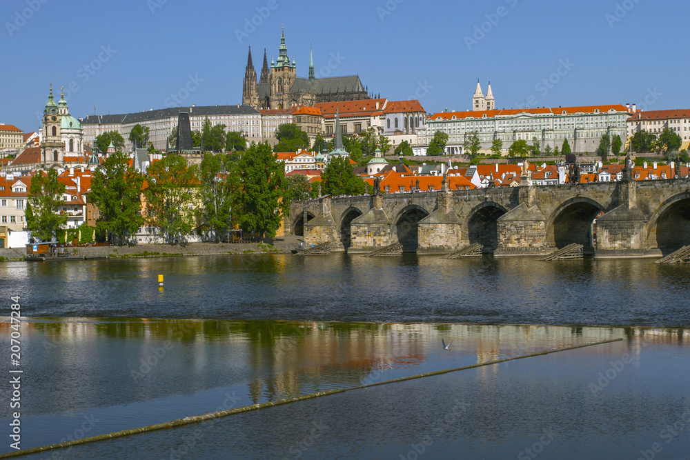 Obraz premium Panoramic View on Old Town , Prague Castle Saint Vitus Cathedra. The bridge over the Vltava River in the sunny Morning. Prague, Czech Republic . European travel. 
