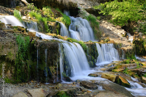 Fototapeta Naklejka Na Ścianę i Meble -  Water streams and cascade of the waterfalls