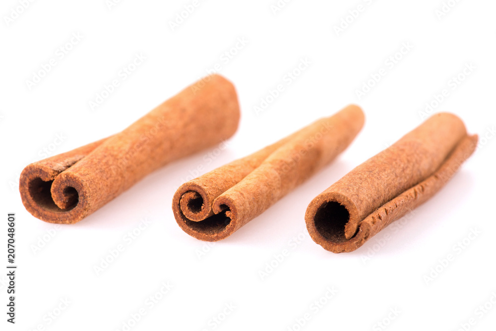Top view of cinnamon sticks isolated on white Top view of cinnamon sticks isolated on white
