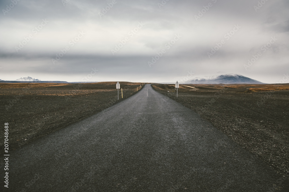 Icelandic lonely road in wild territory with no one in sight