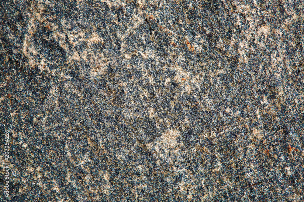 The texture of a granite stone. The texture of a granite stone.