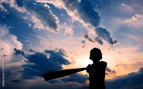 Wall Mural Baseball Boy Silhouette, Boy swinging baseball bat in the clouds