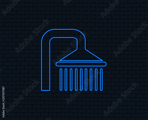 Neon light. Shower sign icon. Douche with water drops symbol. Glowing graphic design. Brick wall. Vector
