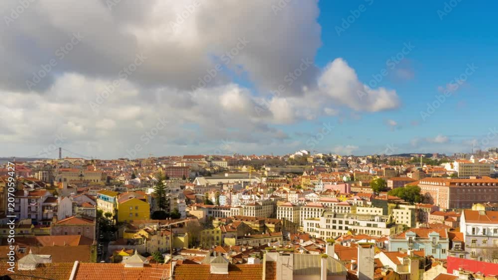 Panoramic time - lapse view on blue sky with fast moving clouds over the centre of Lisboa
