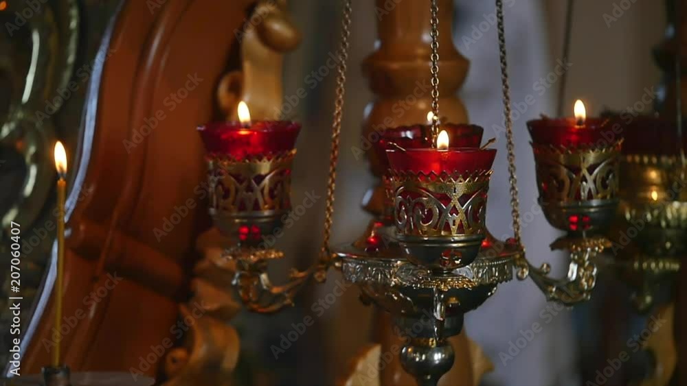 Religious candles burning in church Religious candles burning in church