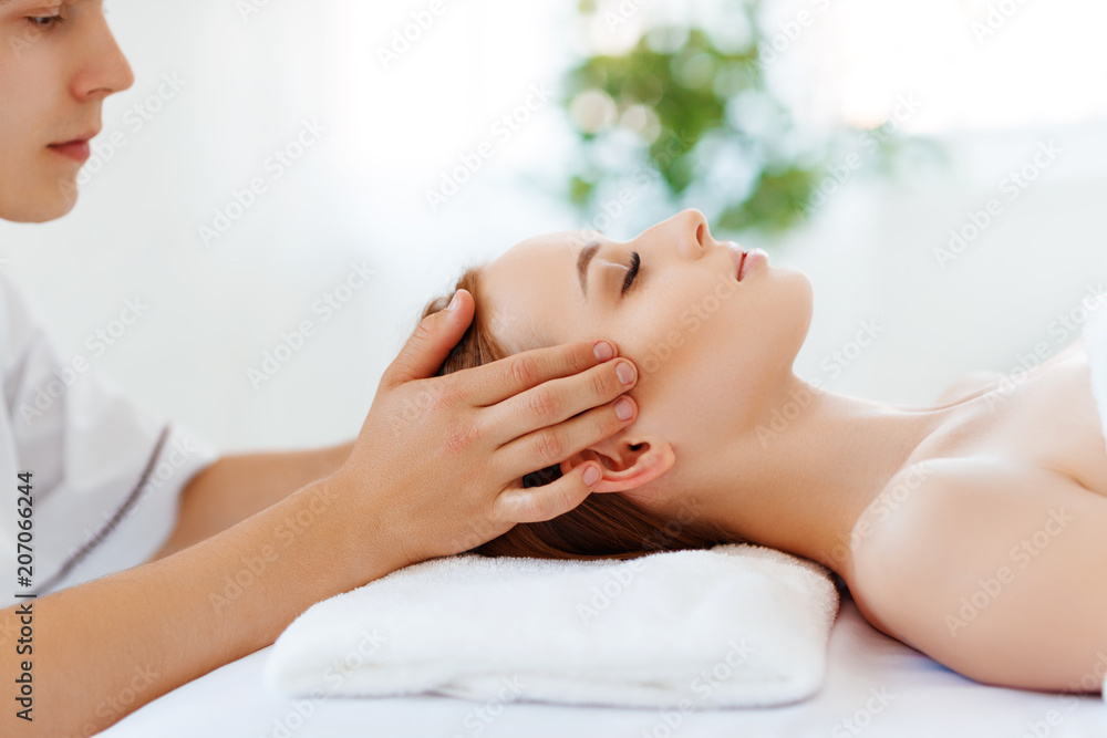 beautiful girl enjoys massage and spa treatments beautiful girl enjoys massage and spa treatments