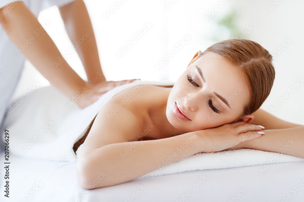 beautiful girl enjoys massage and spa treatments beautiful girl enjoys massage and spa treatments