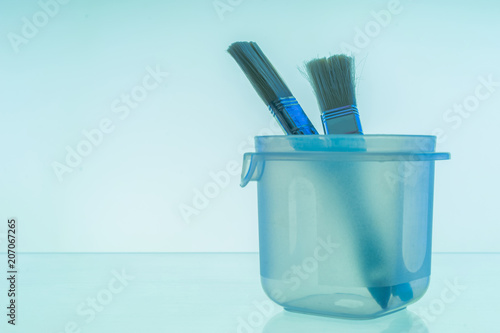 A can for paint. Brushes fo...